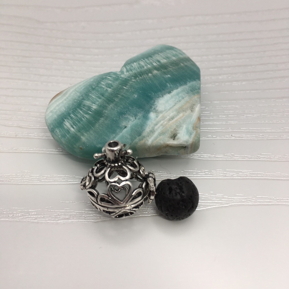 Heart Aromatherapy Silver tone Locket.  Lava stone included.